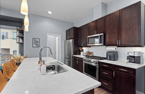 West Colfax House | Rooftop Escape featuring City & Mountain Views a Short Walk to Empower Field!