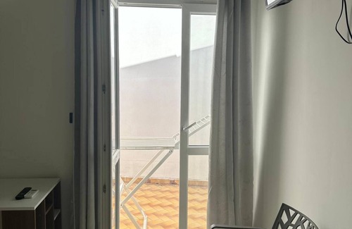 Torre Lapillo Apartment | Room 'Blu Dea - 2' with Shared Terrace, Wi-Fi and Air Conditioning