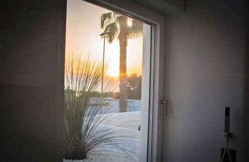 Porto Cesareo Apartment | Room 'Valentino Luxury - 01' with Sea View, Wi-Fi and Air Conditioning