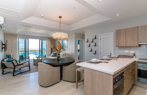 Calvigny Condo | Rose Quartz - 2 Bedroom Luxury Suite with Ocean and Pool Views