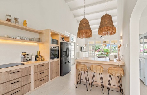 Piscadera Villa | Royal Beach House with sea view and large community pool.