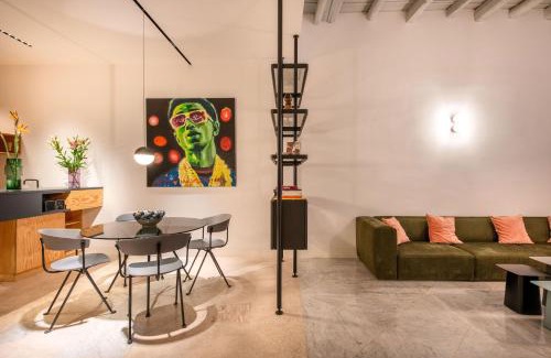 Castellammare Apartment | Sartoria Cavour - Modern Sicilian Elegance in a Former Tailor Shop