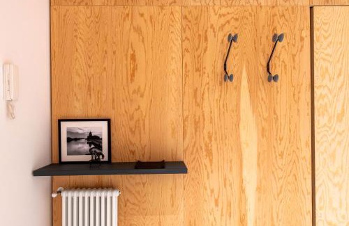Castellammare Apartment | Sartoria Cavour - Modern Sicilian Elegance in a Former Tailor Shop