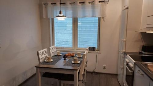 Sotkamo Apartment | Saunallinen lomakaksio Sotkamon keskustassa