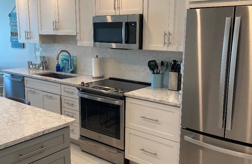 Marco Island Condo | Sea Winds 505.GORGEOUS!.On the Beach.Totally Renovated!
