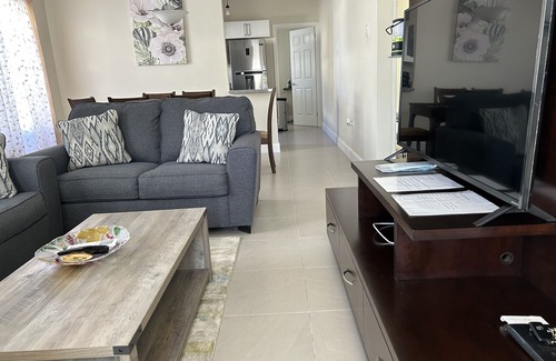 Lucea House | Seamist Holiday home with Spectacular Mountain View, walk to beach pool gym