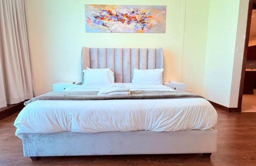Manama Apartment | Seaview Grey 1Bedroom 75 inch SmartTV