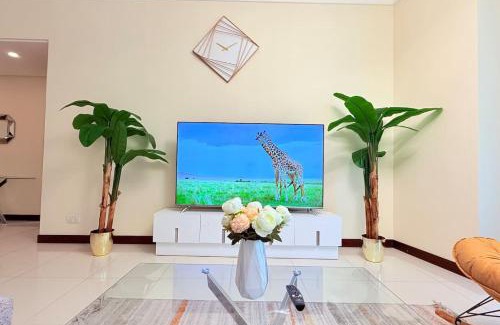 Manama Apartment | Seaview Grey 1Bedroom 75 inch SmartTV