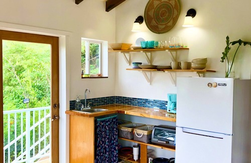 Estate Emmaus Cottage | Secluded Island Escape w/King Bed, Lush Gardens & Shared Pool Access