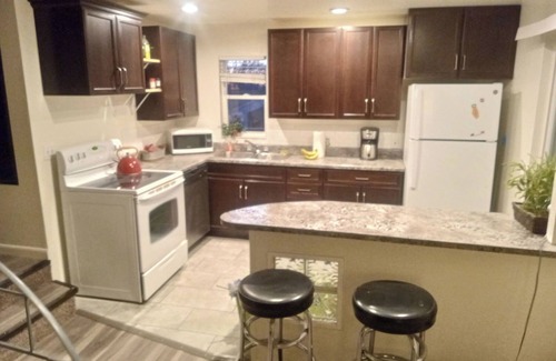 Millcreek House | Secluded Wooded Lot in the Heart of the City