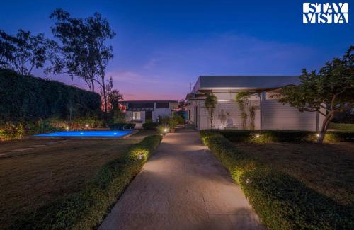 Wadgaon Villa | Serene Garden by VEO - Part of StayVista with Pool and Lawn area