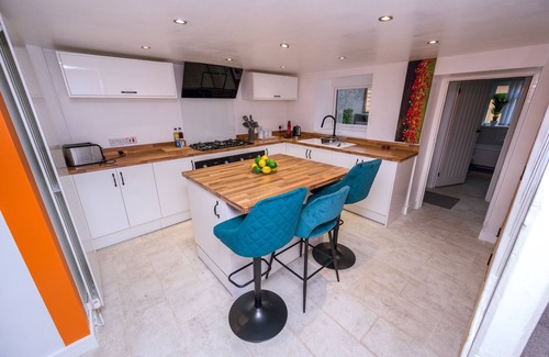 Port Talbot House | Set in Afan Forest Park, this cosy 2-bed retreat is a Guest Favourite for riders, hikers and dog-owners. Light the log burner, Wash your bikes store in the secure shed, and wake up to trails on the doorstep. Pet-friendly, parking included, fast WiF.