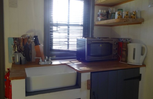 Wigton Cottage | Shepherds hut with hot tub and onsite bistro and gym close to Hadrian's Wall and beach.