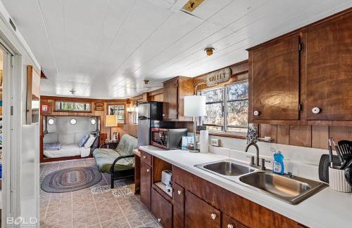 Uncertain House | Ship With Upper Deck & Kayaks & Canoes