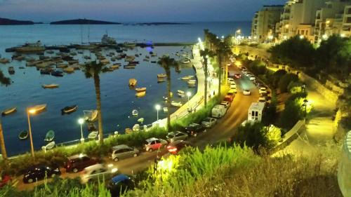 Bugibba Apartment | Side Sea View E, Steps Away to Bugibba Jetty, For the Blue Lagoon Boats and Other Islands