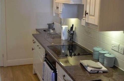 Sidmouth Apartment | Sidmouth seafront apartment, just yards from beach, tastefully furnished.