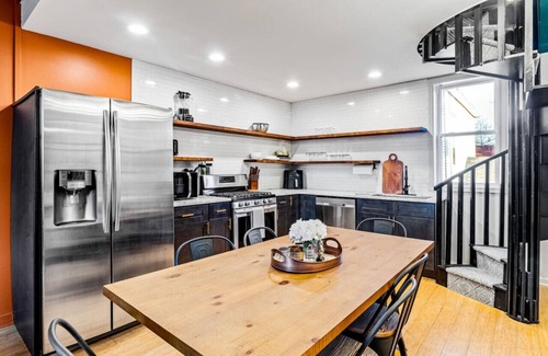 Downtown Louisville Apartment | Sleeps 12, HOT TUB, Cowboy Pool, Firepits, Yard Games