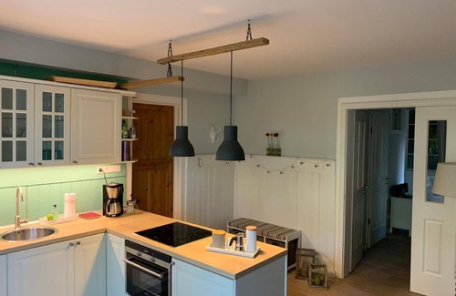 Bleckede Apartment | Small holiday apartment with a bow front and a great view of the natural pond