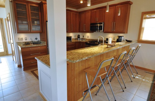 Ocracoke House | Sound Breeze: Contemporary canal front, screened porch, decks.