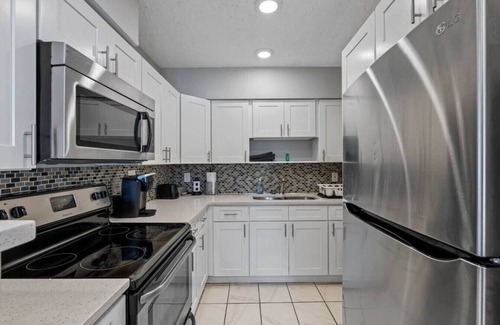 Greater Palm River Point CDC House | Spacious 4 bedroom-Screened pool-Fenced backyard.