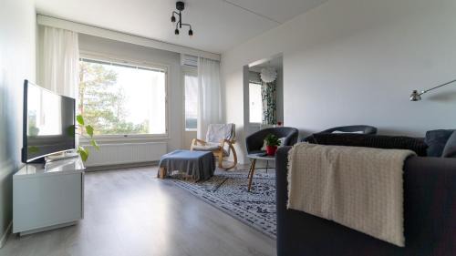 Jarvenpaa Apartment | Spacious 68m2 apartment with fabulous forest view and aircon
