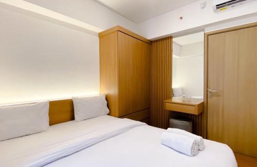 Cikarang Apartment | Spacious and Homey 2BR with Work Space at Meikarta Apartment By Travelio