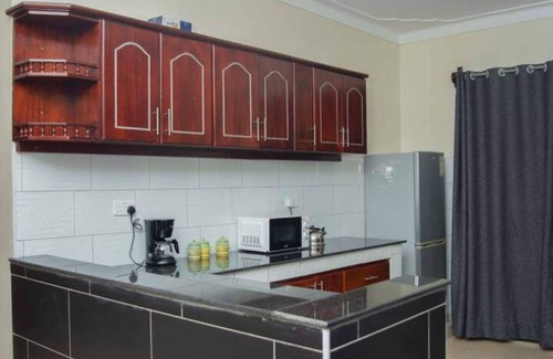 Kampala Apartment | Spacious, luxurious & peaceful 3BR, 3BA near DT large lawn secure free parking.