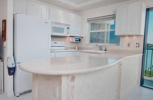 Moorings Condo | Spectacular Bay View In Moorings/Park Shore Three Month Min.