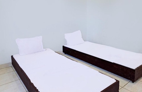 Malang Hotel | SPOT ON 92374 Penginapan Rusunawa