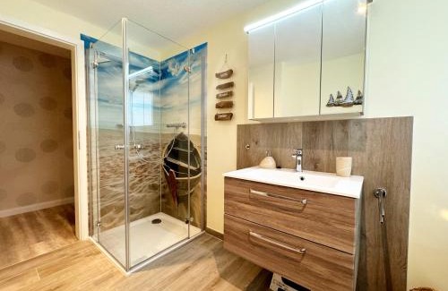 Busumer Deichhausen Apartment | STANMA Heimat am Meer 100 m zum Meer mit Strandkorb