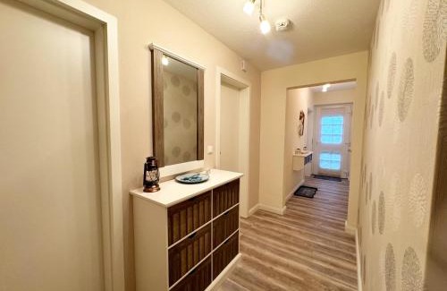 Busumer Deichhausen Apartment | STANMA Heimat am Meer 100 m zum Meer mit Strandkorb