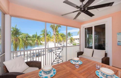Rum Point Apartment | Starfish Kai - Serene Beachfront Condo with Stunning Bay Views & Resort Amenities