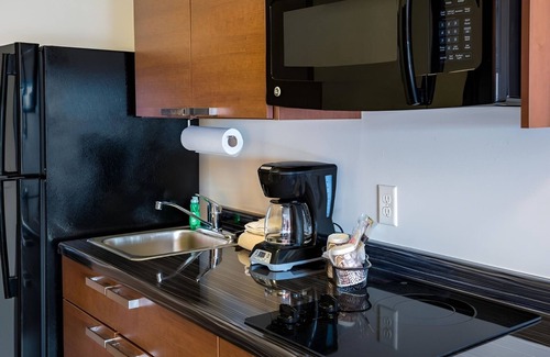 Council Bluffs Hotel | Stay Near Shops + Restaurants in Comfortable Studio w/Kitchen - Pet-Friendly