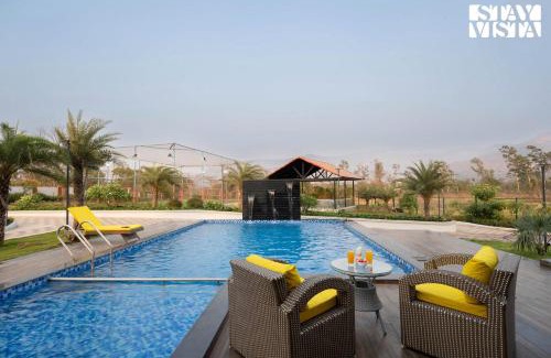 Karjat Villa | StayVista's Oasis Of Solace - Mountain-View Villa with Pool Deck, Kids Zone, Turf & Gazebo