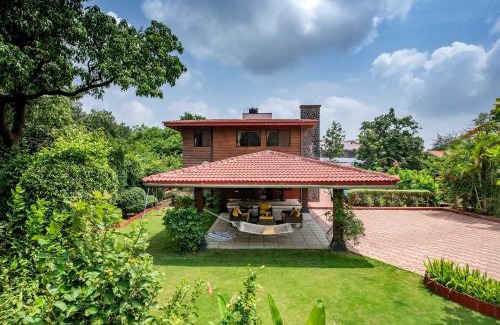 Kune N.m. Villa | StayVista's Woodstone Villa - Mountain Retreat with Heated Pool & Activities