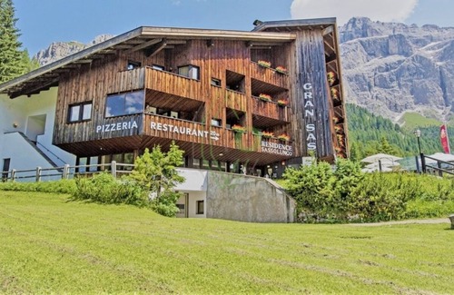 Selva di Val Gardena Condo | Studio apartment in front of Sassolungo mountain