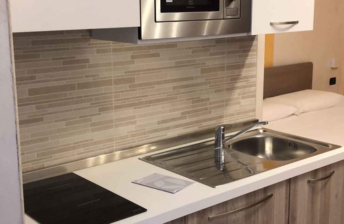 Palmi Apartment | Studio with balcony, pool and sea view