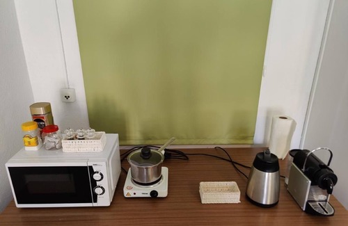 Pizol Apartment | Studio with bathroom and kitchenette