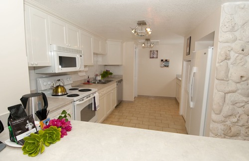 West Bay Condo | Stunning 2BR beachfront condo
