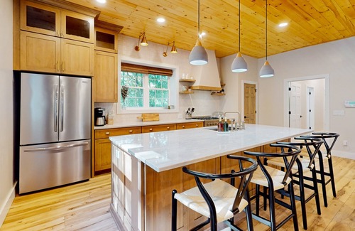Foscoe Cottage | Stunning dog-friendly cottage with riverfront patio, hot tub, fire pit, & views