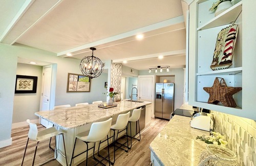 New Smyrna Beach Condo | STUNNING ground floor condo, direct OCEAN front, steps to community pool!