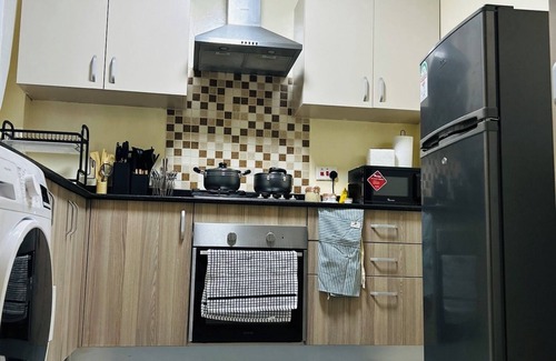 Nairobi West Apartment | Stylish and Cozy 2-Bed Oasis with Rooftop Gym and Pool!