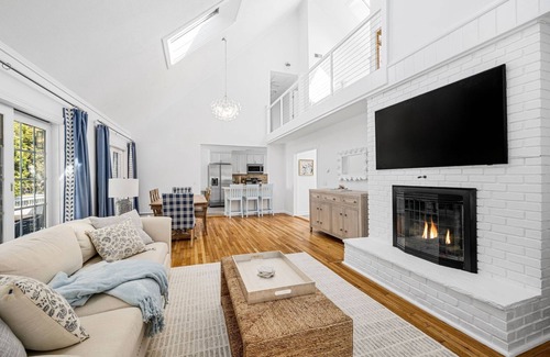 Narragansett House | Stylish coastal retreat w/water views, cozy outdoor firepit &shower, alfresco dining&more!