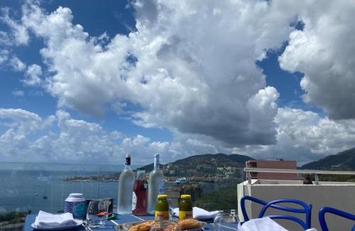 Le Ricanto Bed & Breakfast | Suite avec 2 chambres d'hôtes pour 1 à 4 personnes avec vue mer, terrasse, parking privé, proche port et aéroport, petit déjeuner inclus