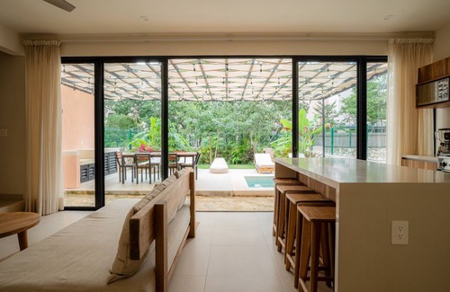 Tulum House | Sun-soaked & modern beach getaway with pool, generous patio, gym, & great views