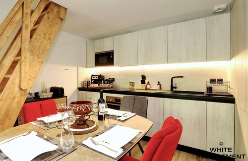 Courchevel Apartment | Superb penthouse with a fireplace and a mezzanine
