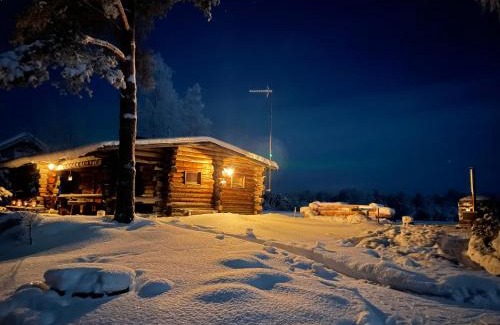 Rovaniemi Ski Chalet | Suvantokoto Riverside Log Cabin