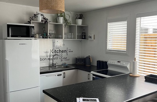 Papamoa Beach House | T Two Salty Shack - right across from the beach!