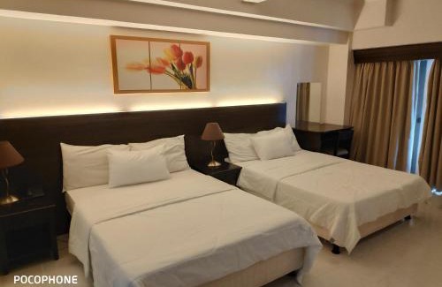 San Jose Apartment | Tagaytay Staycation by Naya and Darla w Free Swimming Pool, WiFi & Netflix