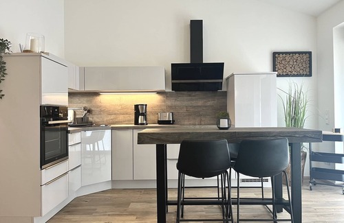 Rottach-Egern Condo | Terrace, quiet and central. Apartment with high ceilings and bathtub for relaxing